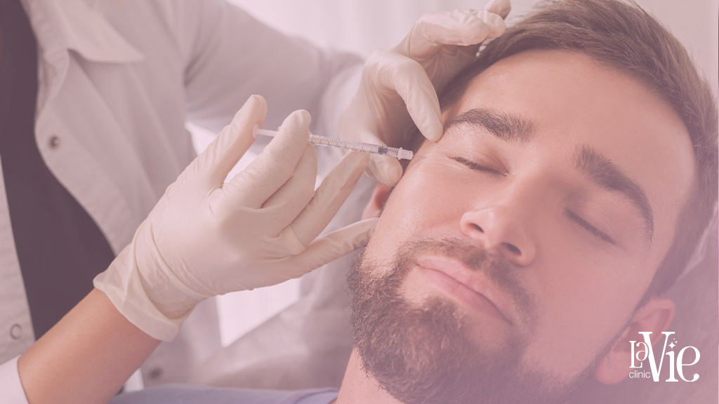 a person getting an hyaluronic acid facelift injection